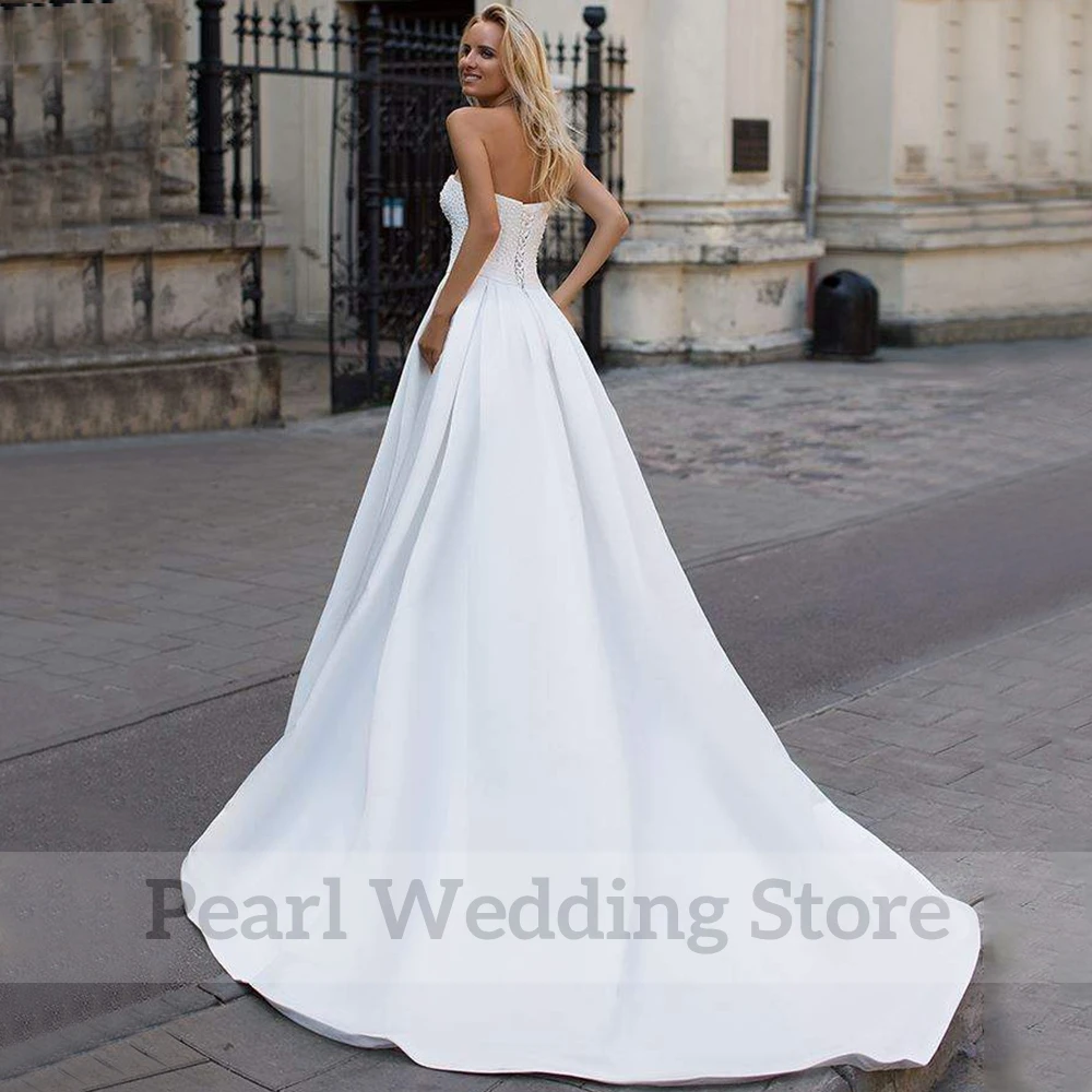 Robe de mariée élégante sans bretelles avec ceinture, ligne A classique, longueur au sol, dos ouvert, lacets, patients, sur mesure, mariage, quoi que ce soit