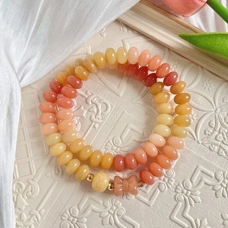 

Natural Gradient Pink Bodhi Abacus Beads Double Loop Bracelet