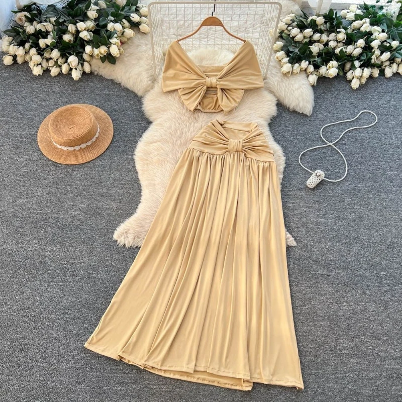 

Стильный летний комплект для отдыха: сексуальный однотонный топ с бантом и открытыми плечами, короткий, элегантный, с плиссированной юбкой, для женщин.