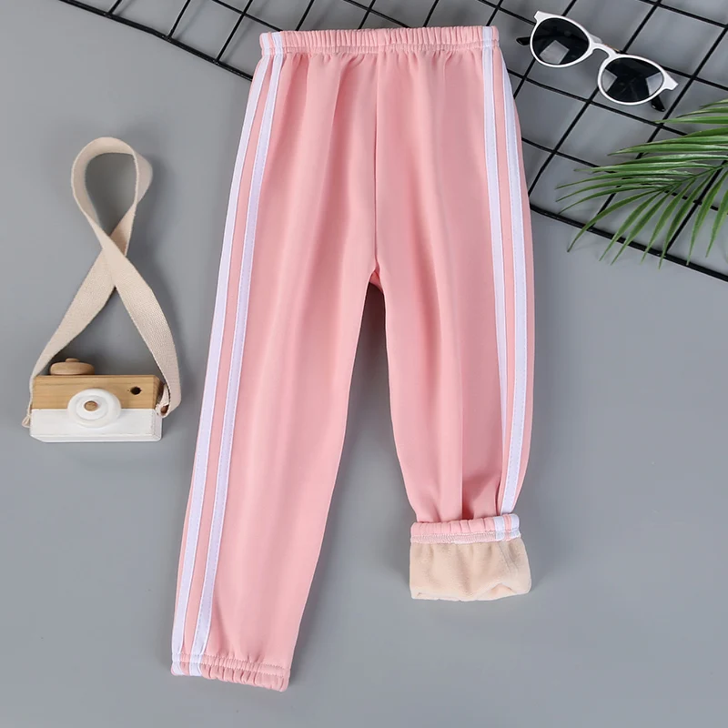 Autumn and winter children\'s solid color sports plus velvet pants boys and girls comfortable leisure warm sports fashion pants.