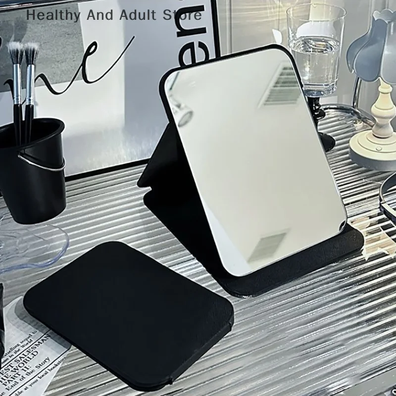 Desktop-Make-up-Spiegel, einfarbig, PU-Leder, einfacher tragbarer schwarzer Handspiegel, faltbar, für Studenten, kompakt, niedlicher Taschenspiegel