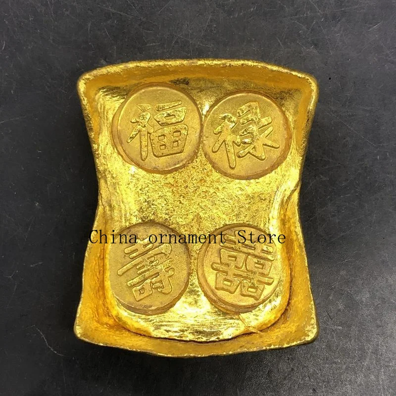 Antique-style Qing Dynasty gold-plated ingots depicting the symbols of fortune, longevity, and happiness, crafted as decorative