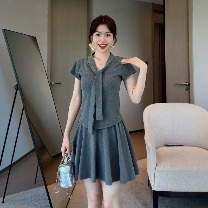 Hot 2026 Springsummer New Women Koreansimple Large Set Design Sense Short Sleeve High Waist Temperament Short Skirt Two Pieceset