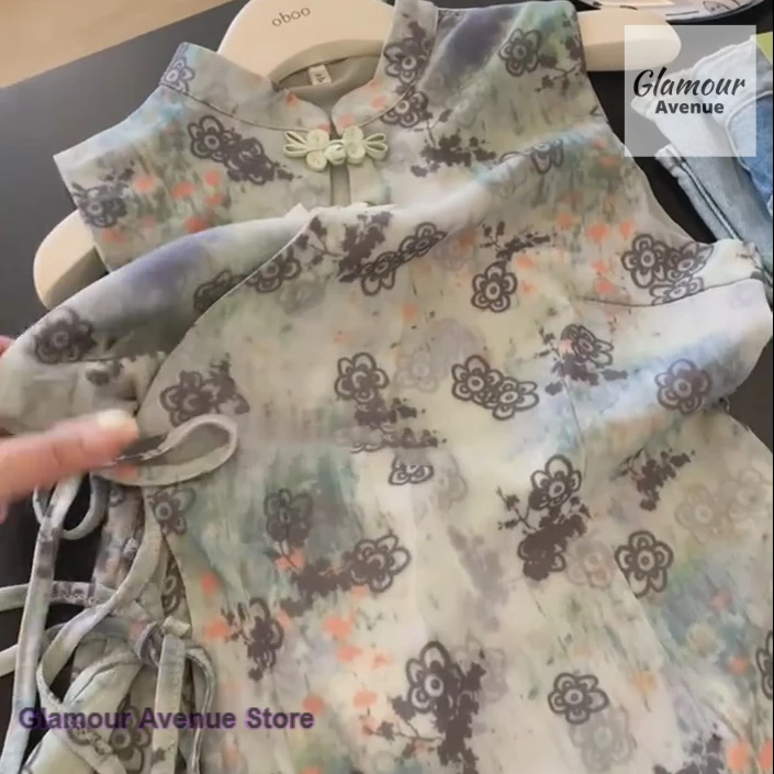 

New Chinese style national style buttoned sleeveless shirt female summer new fat mm beautiful casual floral blouse Joker top.