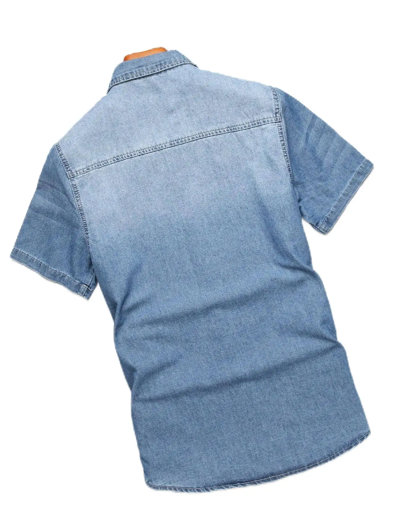Men's Summer Blue Short-Sleeved Denim Shirt with Ripped Details. The Ripped Design Elements Showcase a Trendy and Casual Style