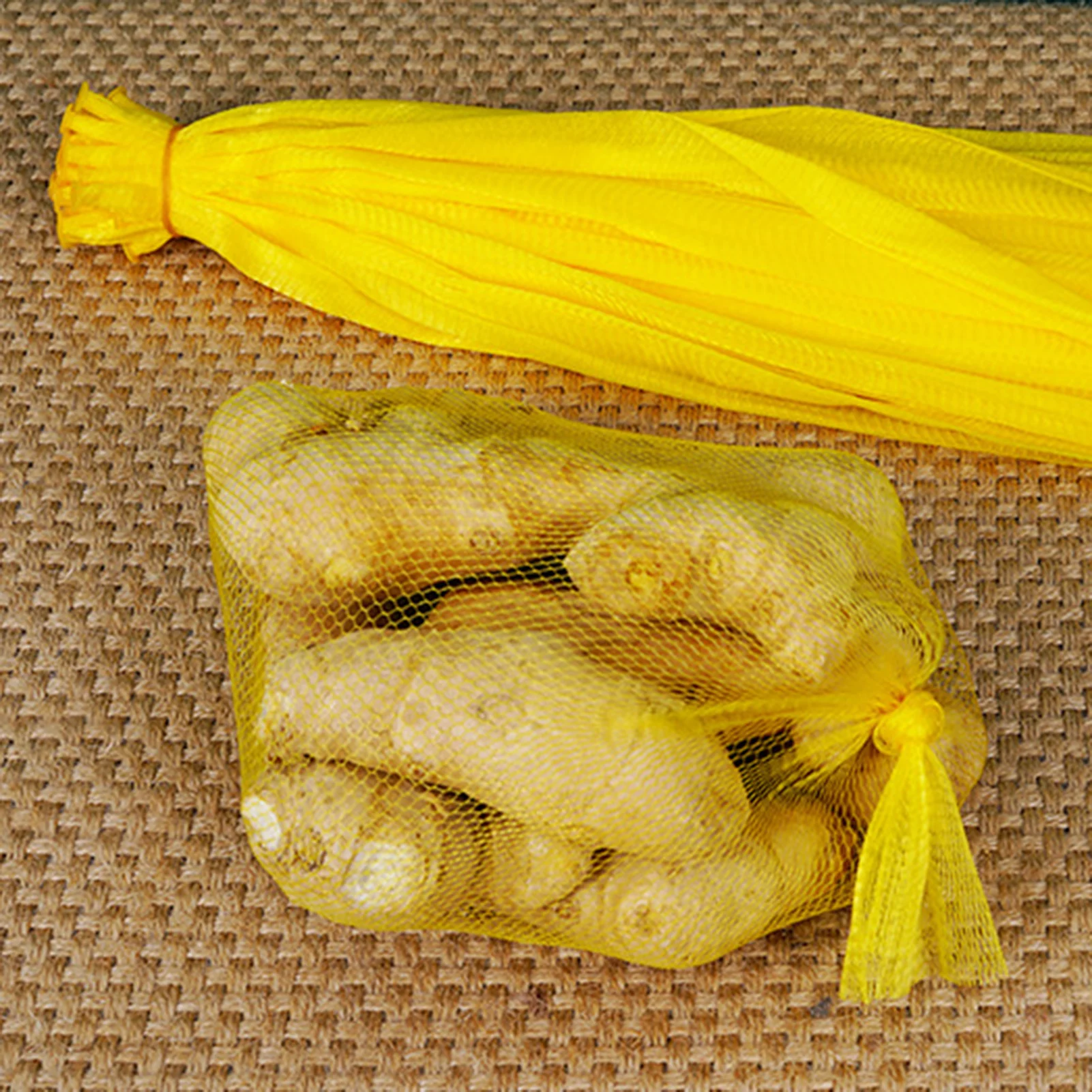 100 Stück Knoblauch-Ingwer-Mesh-Aufbewahrungsbeutel, robuste, langlebige Knoblauchnetz-Aufbewahrungsbeutel für die Aufbewahrung in der Küche zu Hause