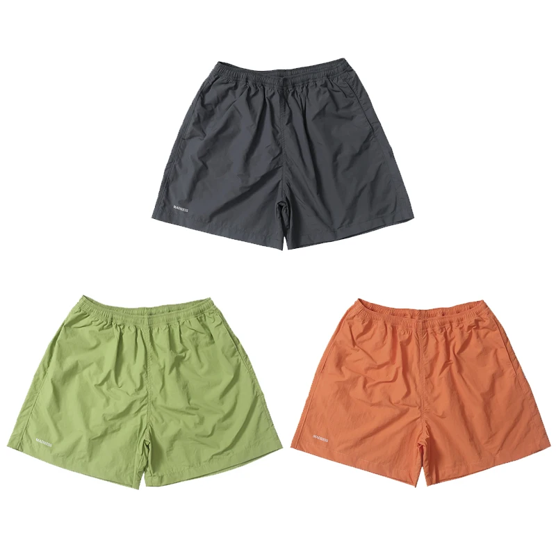 

MADN MDNS 25ss Qui Dry Nylon Повседневные спортивные брюки с низкой талией Свободный крой Летние молодежные модные ретро японский Sle