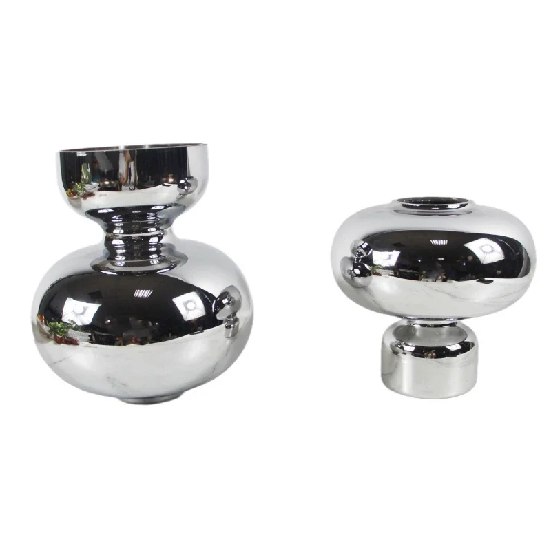 

Modern minimalist electroplated silver colored blue glass vase