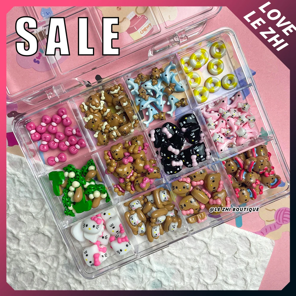 

Boxed 120Pcs Kawaii Black Skin Sanrio Hello Kitty Nails Art Charms Accessories 3D Beach Bow Dolphin Resin Nails Decor Promotion