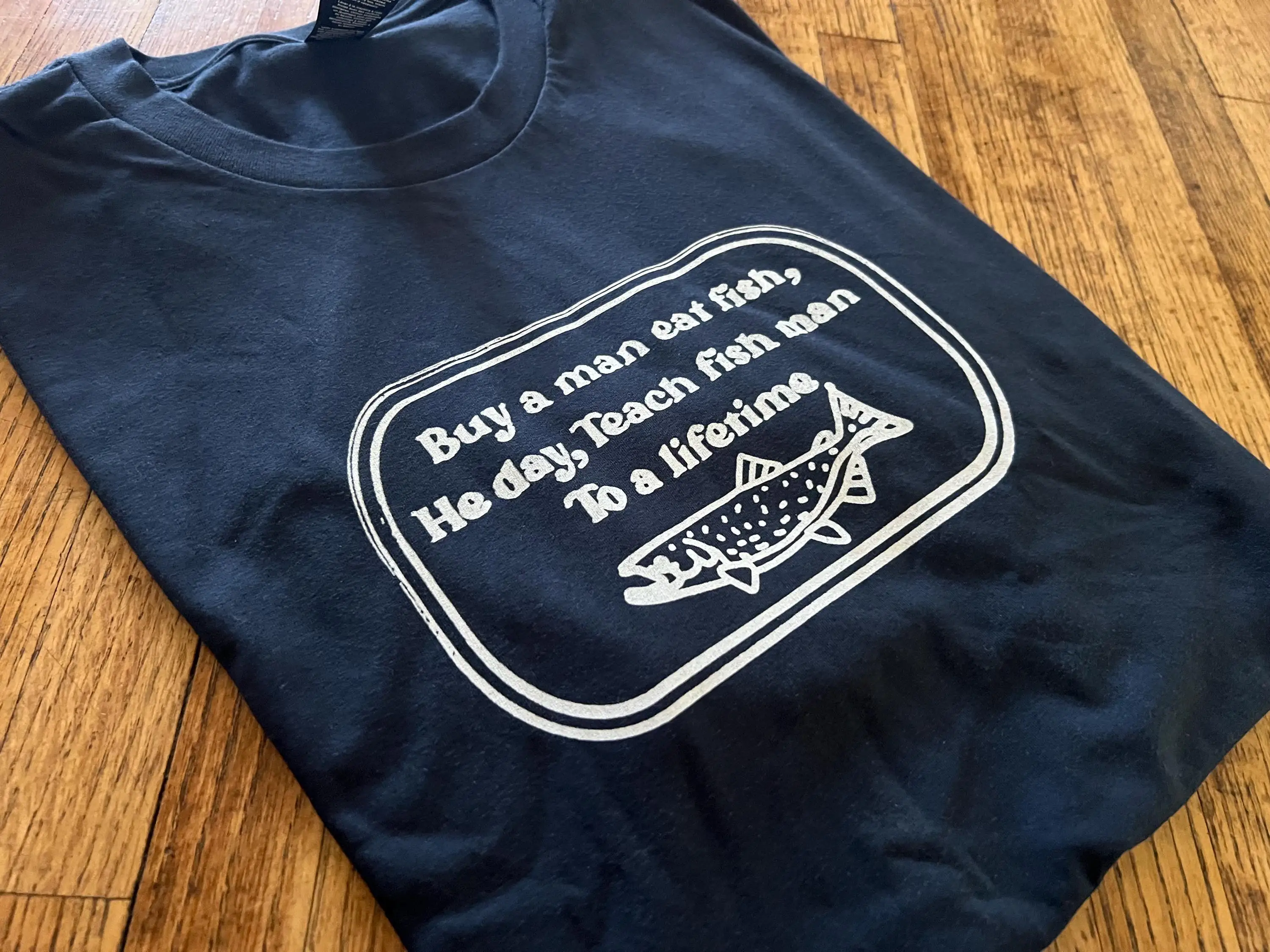 Buy A Man Eat Fish, He Day, Teach Fish Man To A Lifetime Unisex T-Shirt