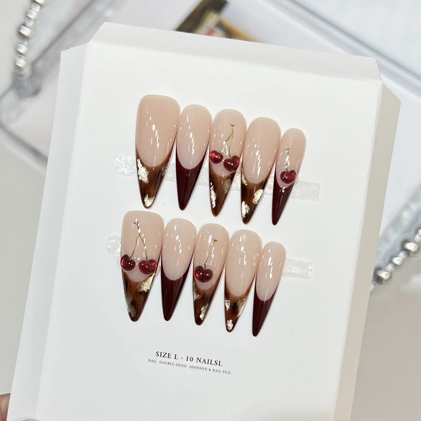 10 szt. Luksusowe, ręcznie robione, długie sztuczne paznokcie typu stiletto, nude z panterką, efekt kociego oka, francuski manicure, dekoracje 3D z czerwonymi wiśniami, paznokcie do noszenia.