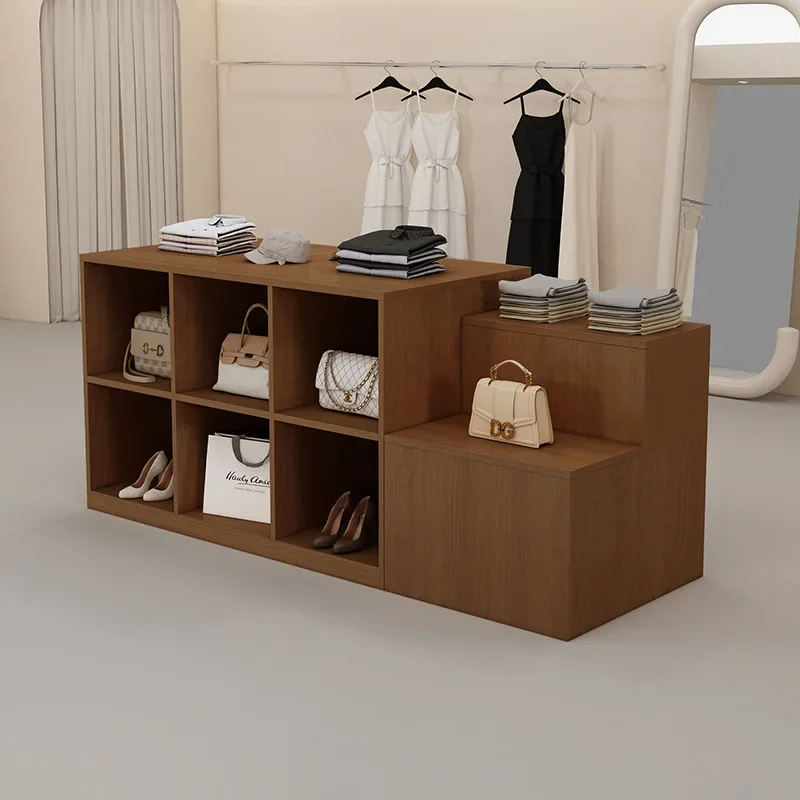 Island table in the clothing store, women's clothing store, with a flow table in the middle