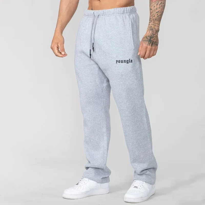 Men's youngla sweatpants in autumn and winter new gym sports fitness cotton printed bouquets foot leisure pants.
