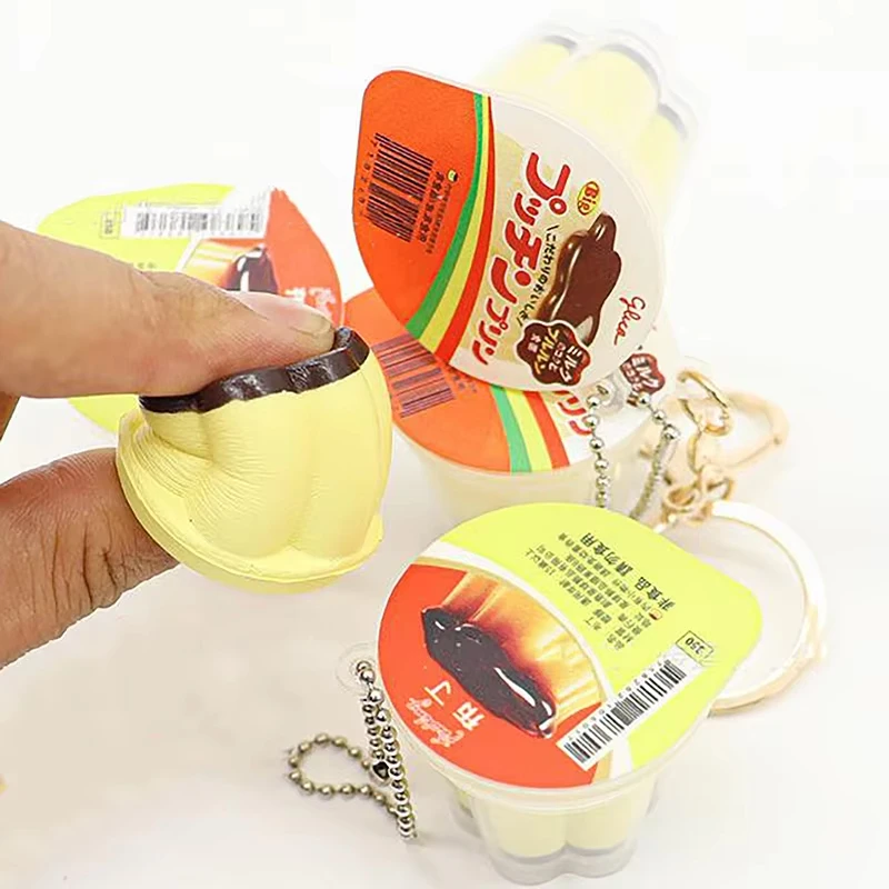 Neuheit Pudding Anhänger Essen Spielen Reduzieren Druck Schlüsselbund Duft Antistress Zappeln Stress Lindern Rucksack Dekor Kinder Spielzeug
