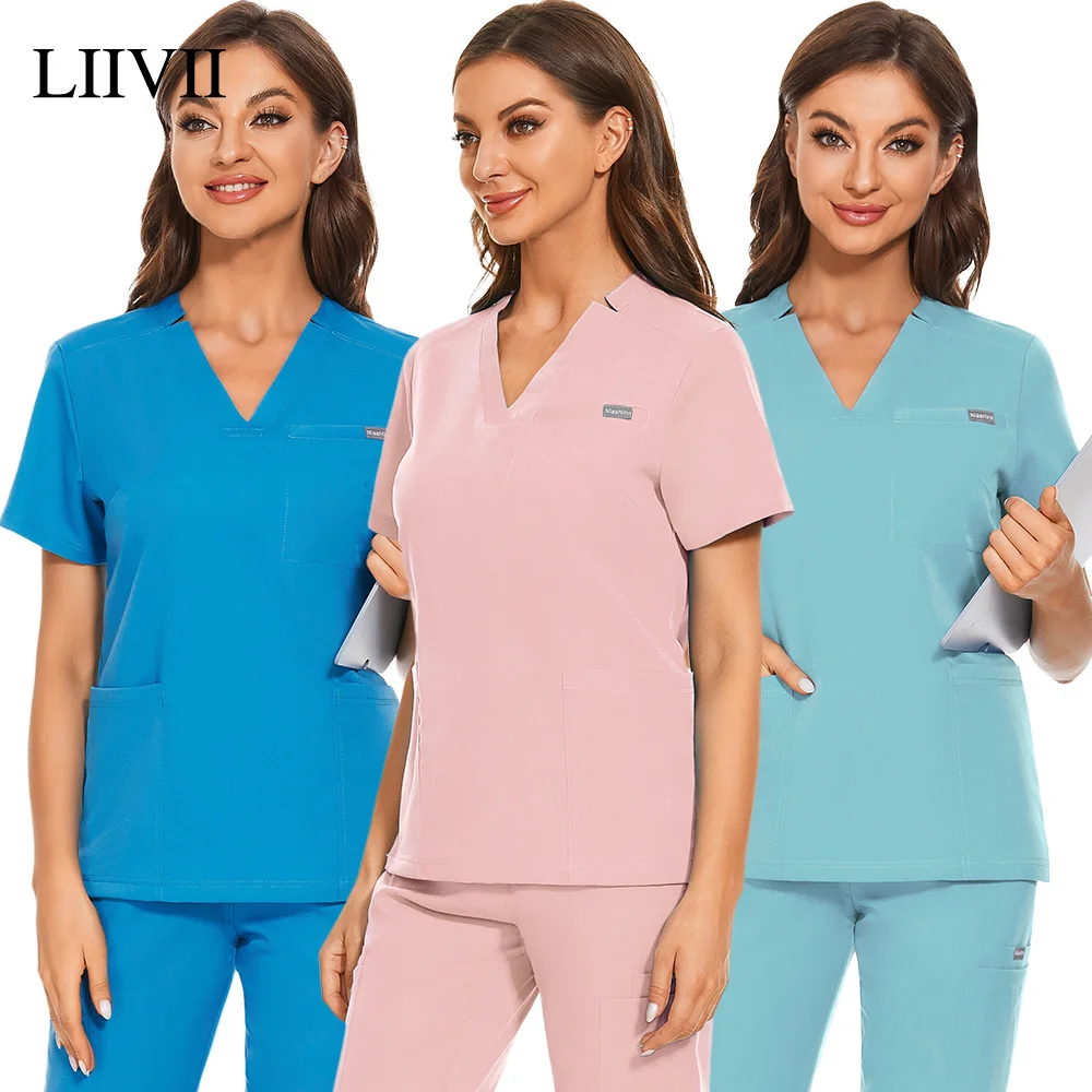 

Men Women Nursing Nurse Blouse Short Sleeve V-neck Scrub Tops With Pocket Spa Shirt Unisex Work Wear Uniform New