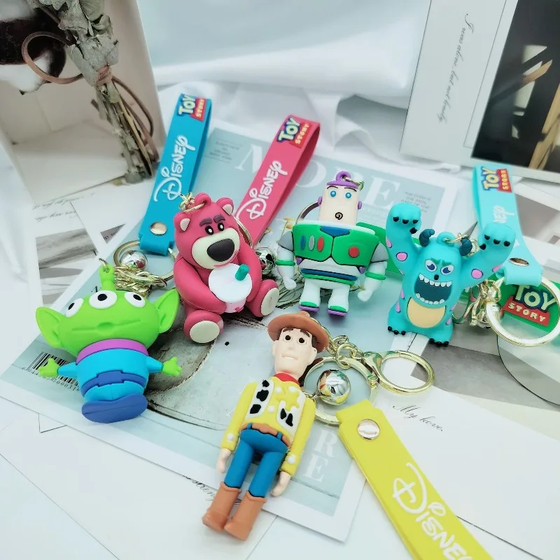 Kawaii عروسة كارتون الطنانة الخفيفة الفراولة الدب المفاتيح ثلاثة عيون مضحك دمية حقيبة