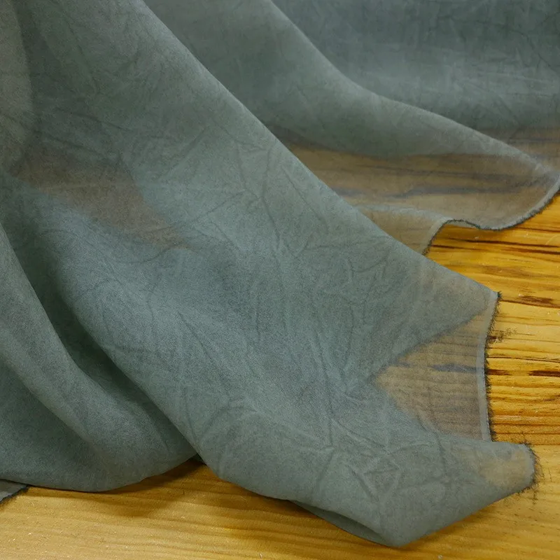 

10 momme georgette silk fabric with a mottled light slightly stiff and wide dirty dyed