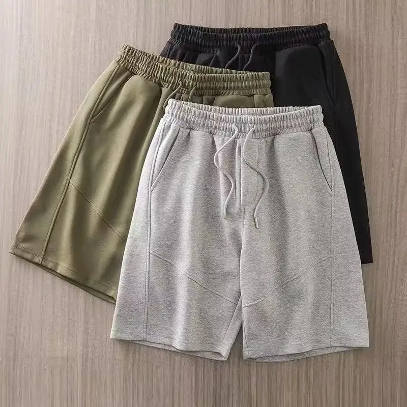 

Новые летние мужские брюки в американском стиле, тонкие дизайнерские свободные спортивные повседневные брюки большого размера с пятью четвертью, молодежная активная одежда из полиэстера...