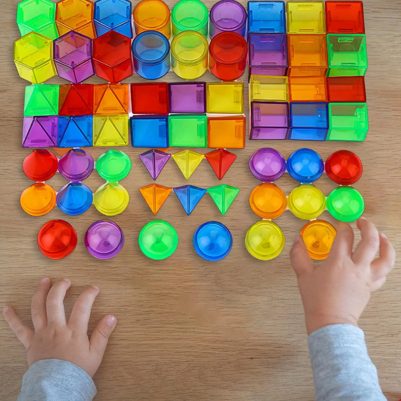 Brinquedos geométricos dos Montessori dos sólidos, destacáveis coloridos da interação pai-filho