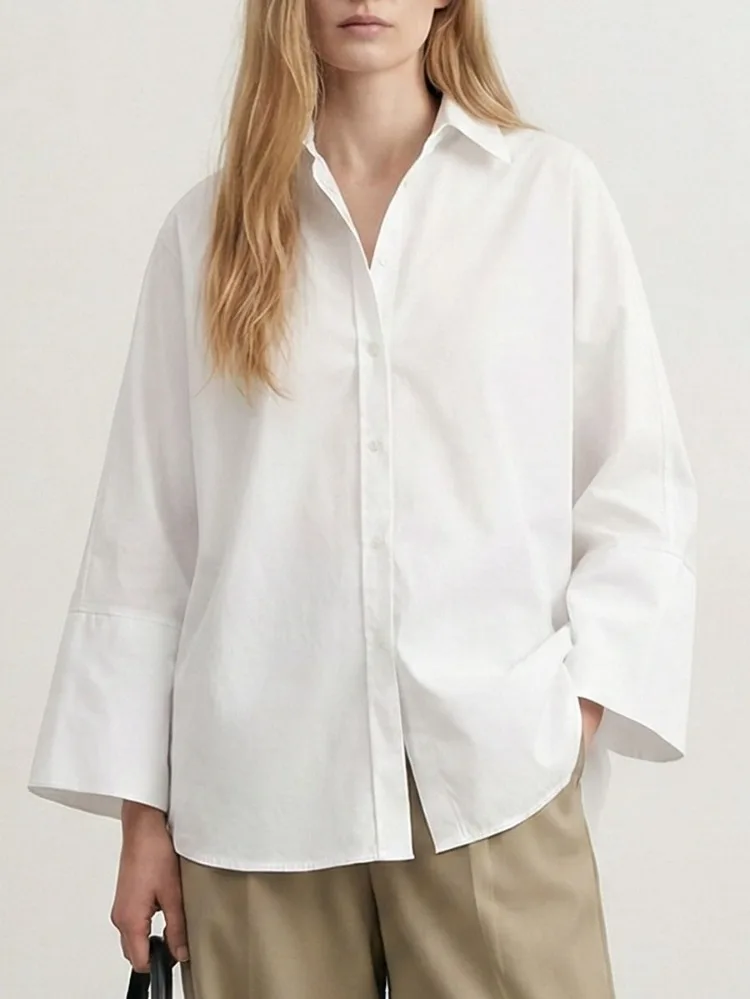 

Yeezzi 2026 Новые весенние однотонные блузки оверсайз с отложным воротником для женщин, расклешенные рукава, на пуговицах, минималистичные, для офиса и повседневной носки