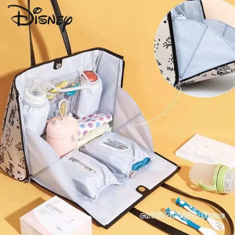 Disney mickey múmia portátil saco de moda um ombro portátil saco multifuncional grande capacidade de armazenamento de bens do bebê