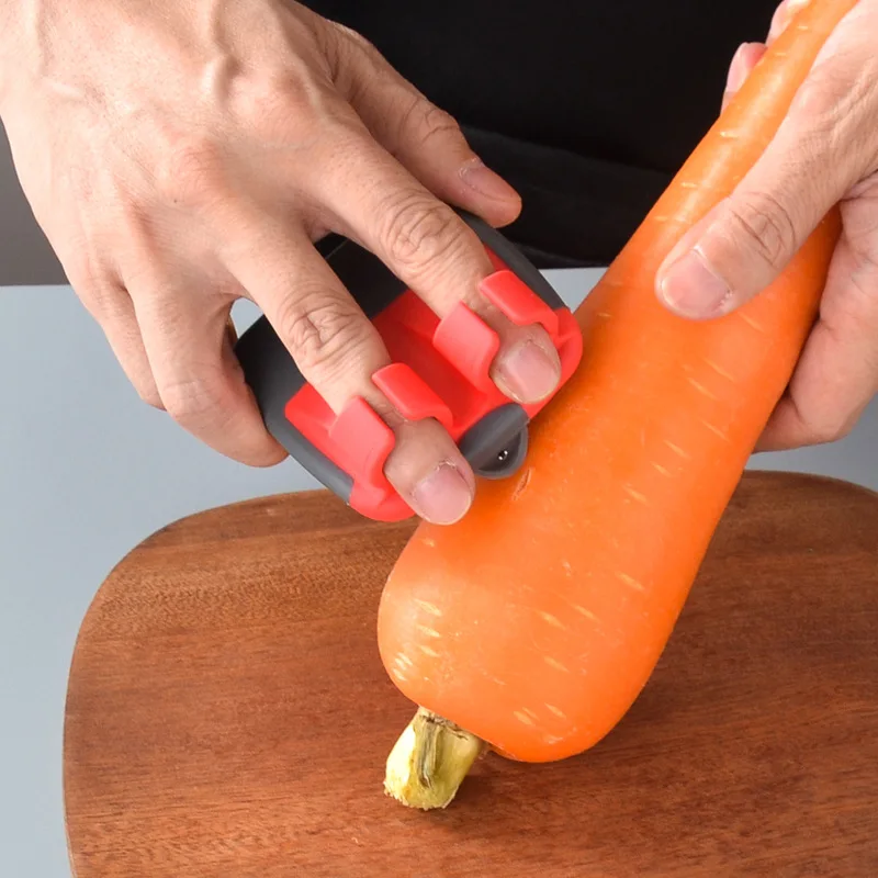 Two finger peeler, fruit peeler, multifunctional stainless steel finger kitchen and household melon and fruit tool