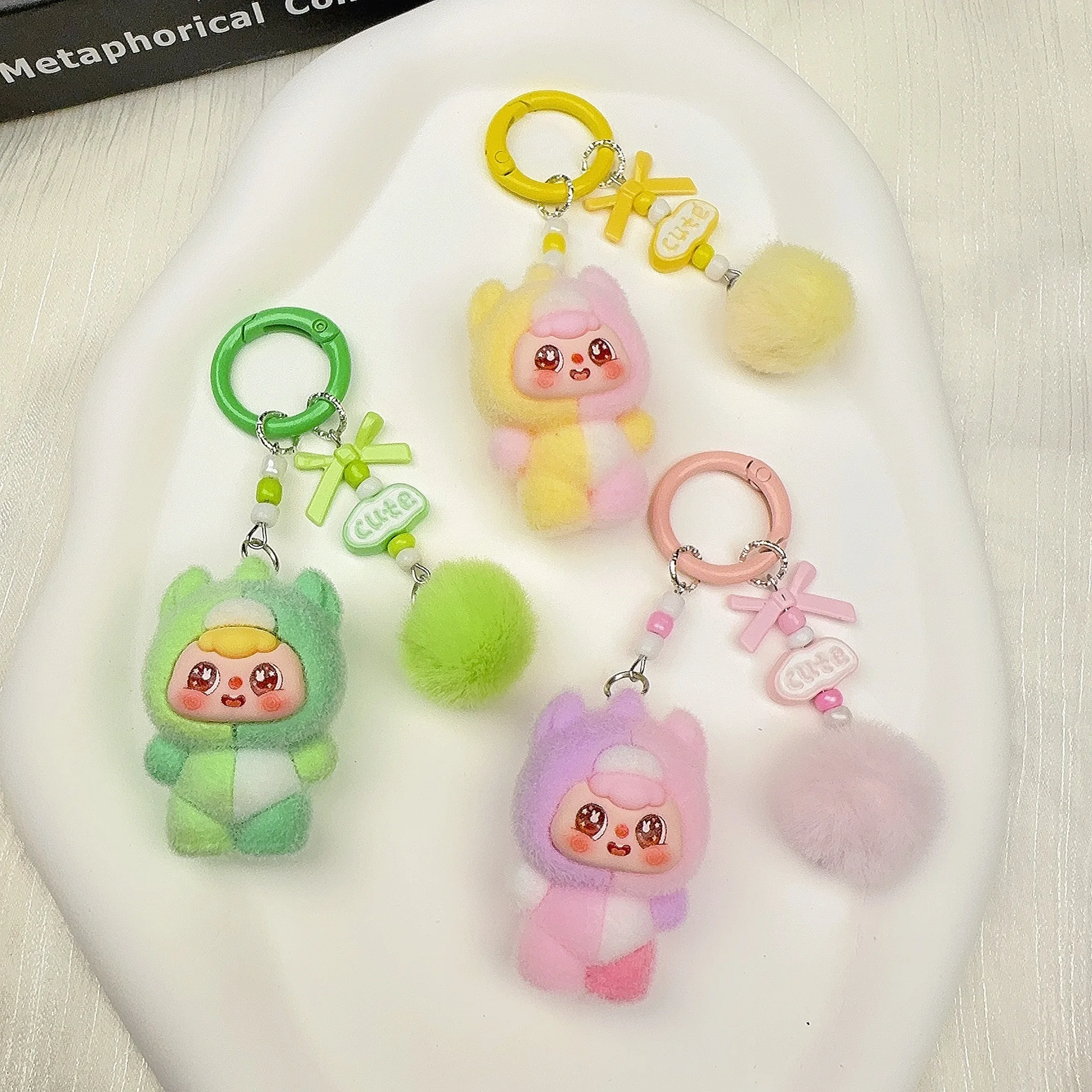 

New cute plush multi-color cute figurine keychain accessory for girls' bags, trendy plaything with a touch of youthful charm
