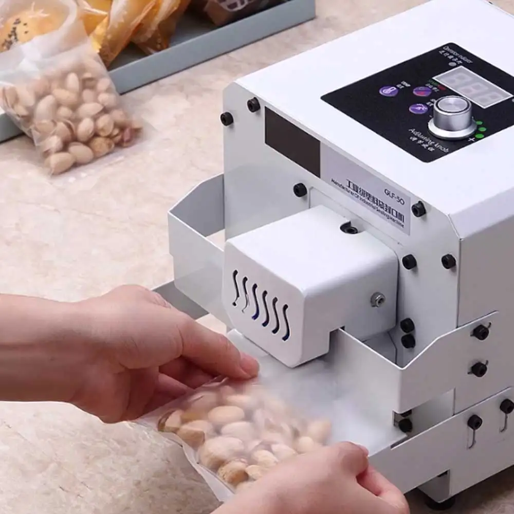 Sigillatrice per alimenti in sacchetto di plastica sigillatrice per sacchetti di Mooncake completamente automatica commerciale piccola termosaldatura
