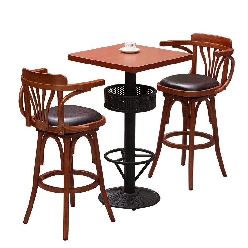 

A Industrial style revolving bar chair bent wood mid-rear bar with armrests