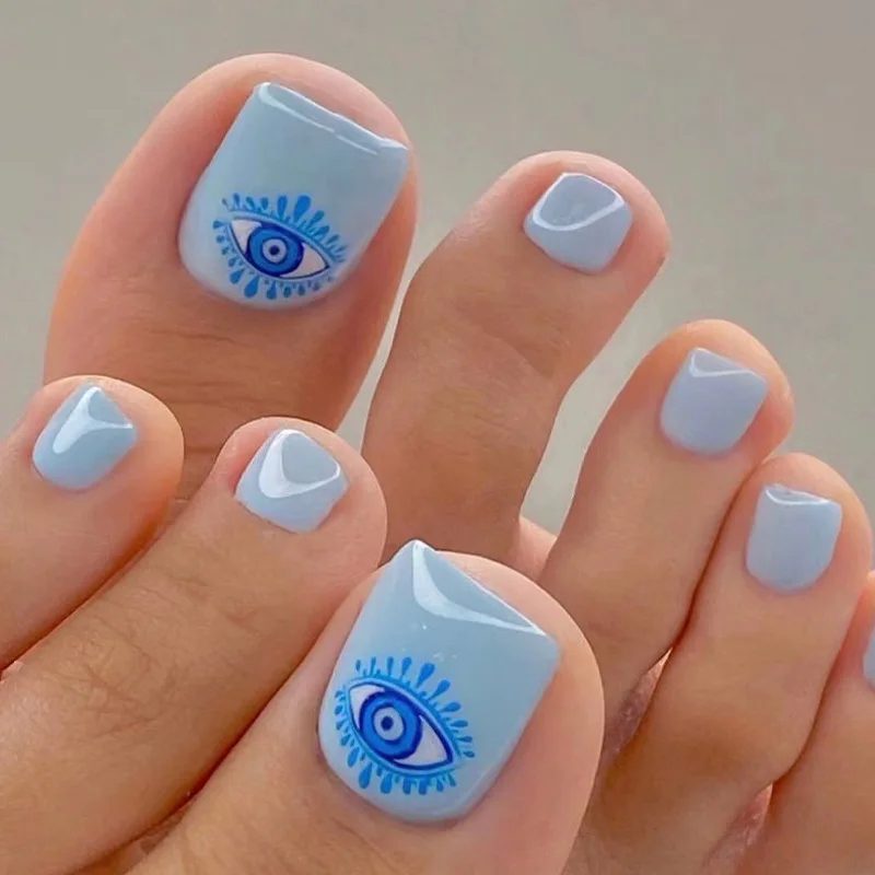 

24Pcs Toe Press on Nails - Light Blue Solid Color with Blue Eyelash Eye Designs | Whimsical Style False Toenail For Women Girl