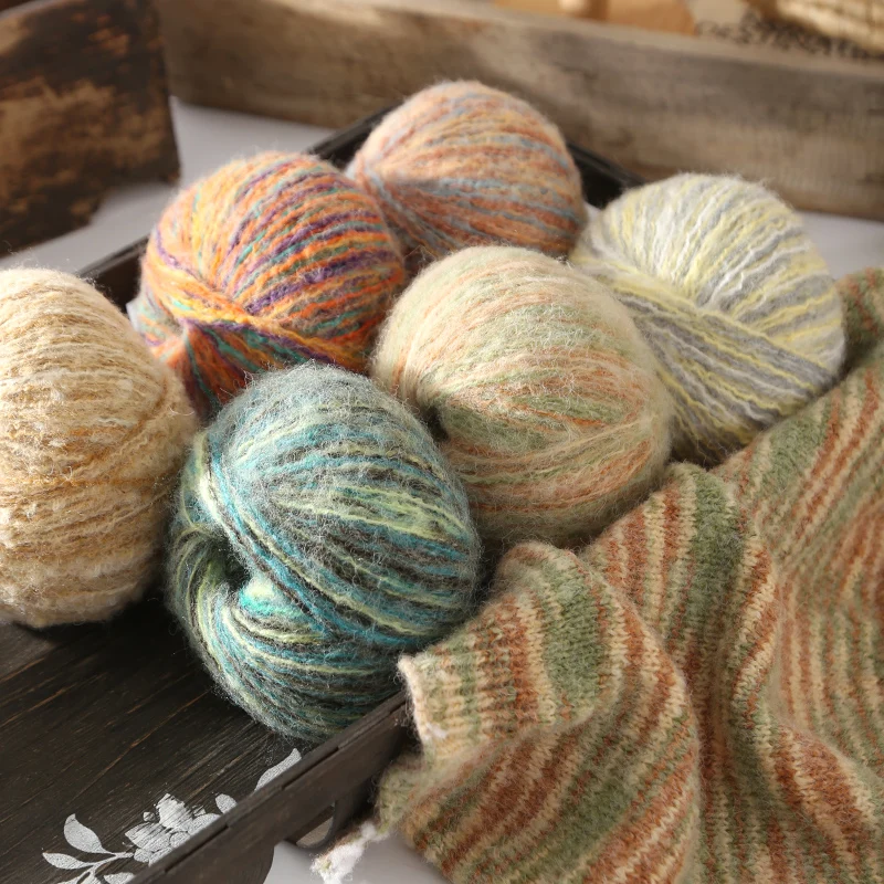 

300gGradient-colored yarns made from mohair with a fuzzy texture, showcasing a vibrant array of colorsCreating sweaters, scarves