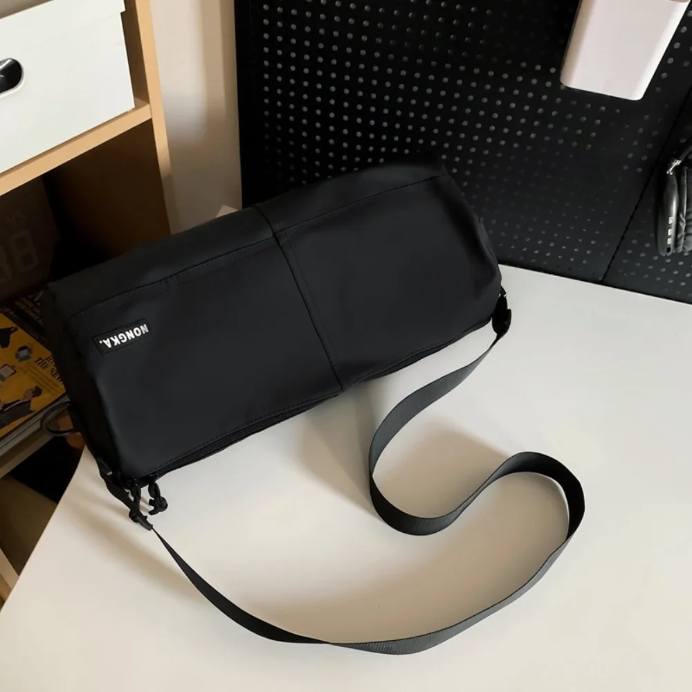 

Causal Sports Shoulder Bag Large Capacity Lightweight Nylon Cloth Shoulder Bag Solid Color Leisure Cylinder Messenger Bag Unisex