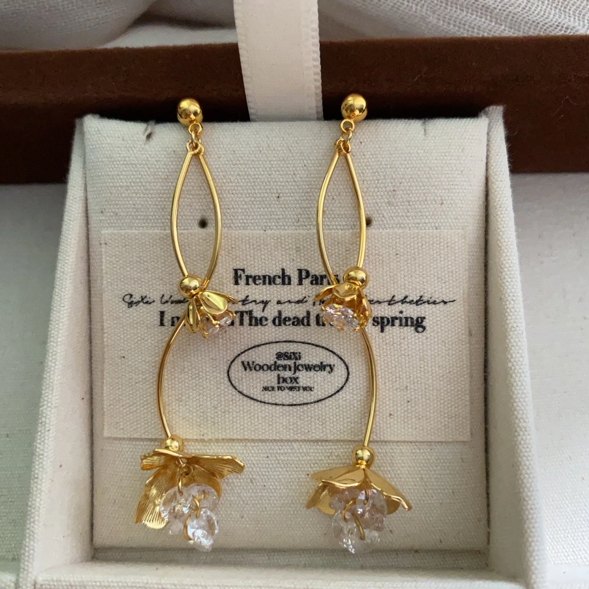 

Chic 22K Gold Plated Lily Of The Valley Ear Drop Dangle Ins Influencer Floral Buckle Hoop Long Earring Wholesale Women Jewelry