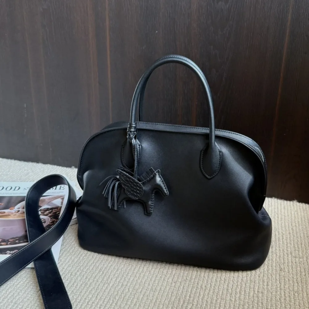 

Niche First-layer Cowhide Document Tote Bag, Minimalist Hand-held Shell Bag, Women's 2025 Large-capacity Shoulder Messenger Bag