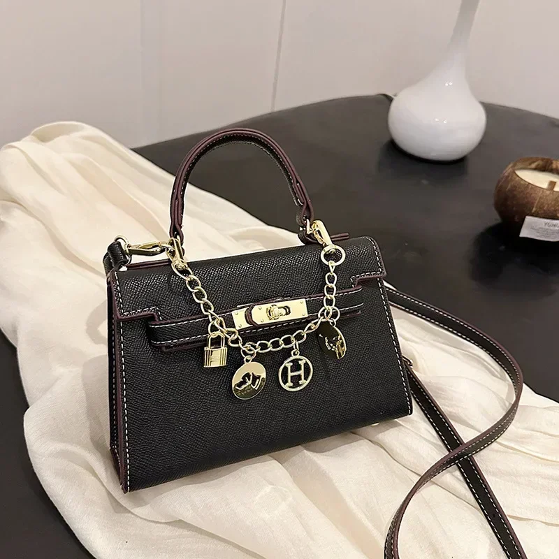 

Новинка 2023 года, женские сумки, минималистичная сумка-тоут/сумка через плечо с пряжкой на замке, платиновая сумка Kelly/материна, стильный ежедневный и дорожный компаньон