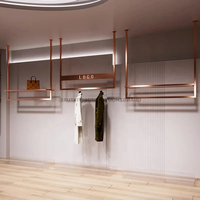 custom.New Design Clothing Store Shelves Display Racks Stainless Steel Cloth Display Racks Shops Gold Wall Shelf Display