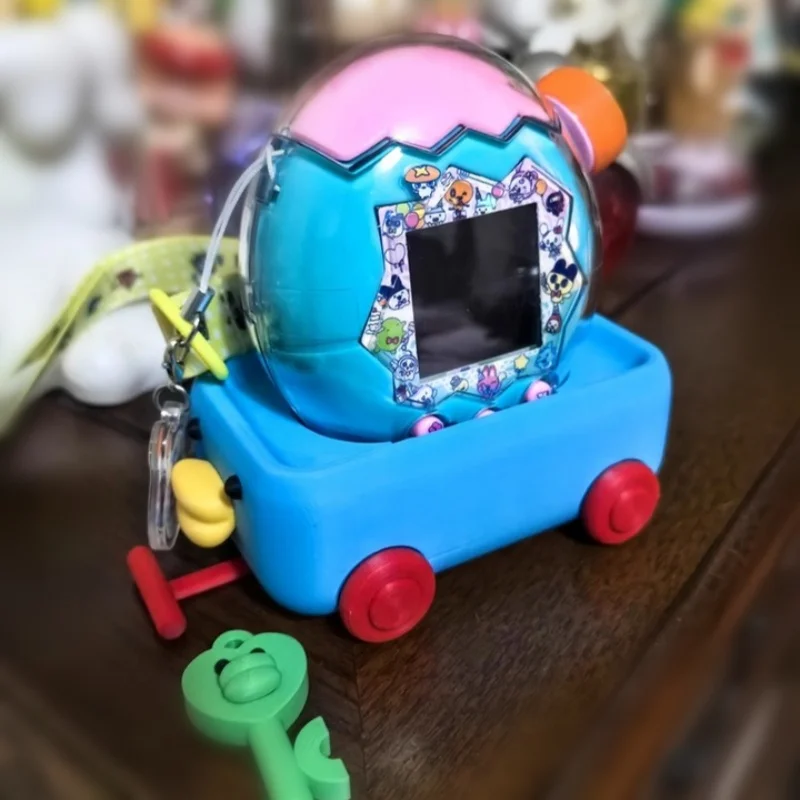 Adequado para tamagotchi paraíso esmeralda floresta botão capa protetora adorável com ovo-caça base de carro menina festival presente