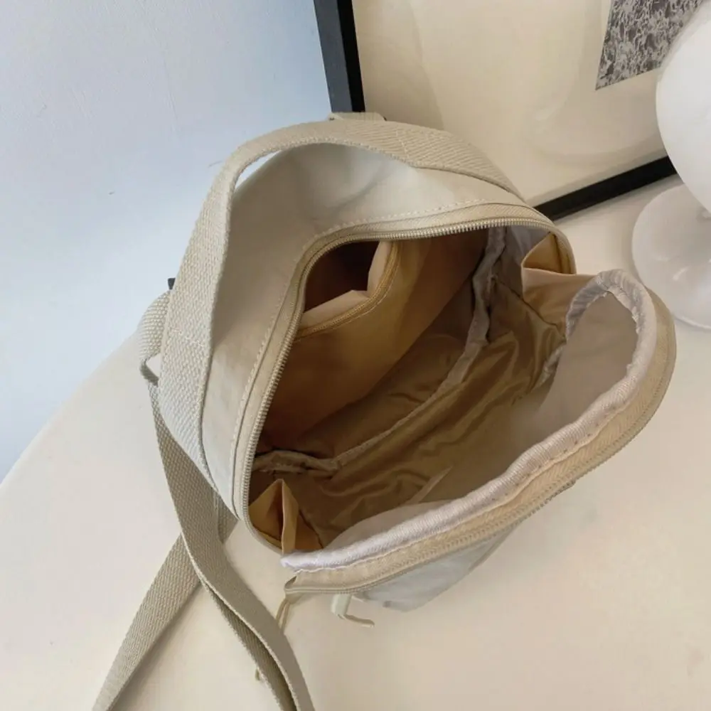 

Korean Style Nylon Shoulder Bag Mobile Phone Storage Solid Color Small Round Bag Handbags Purse Mini Crossbody Bag Office Worker