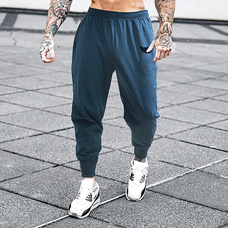 Mens Autumn Fashion Breathable Fitness Streetwear Elastic Waist Bodybuilding Letter Printed Trousers 4 Colors