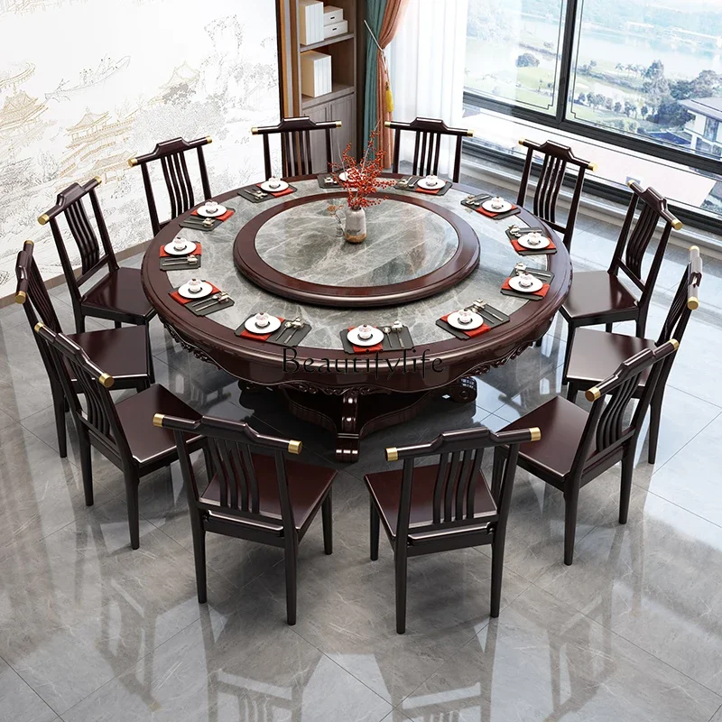 

03.New Chinese antique carved solid wood dining table household solid wood rock slab large round table