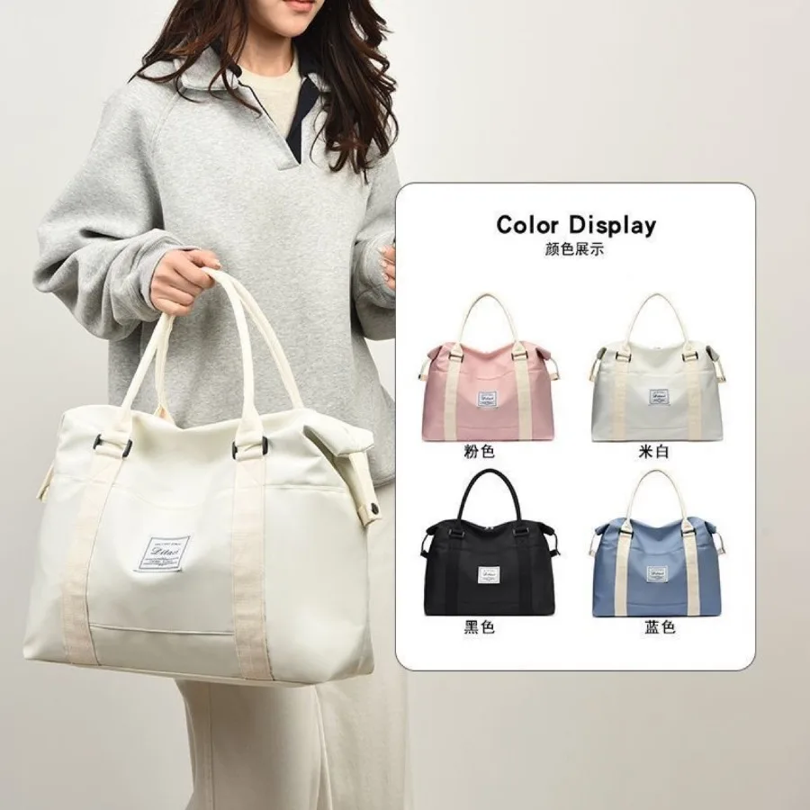 

【Новый стиль】Дорожная сумка для женщин, вместительная сумка для ручной клади, дорожная сумка для хранения одежды, мужская сумка для поездок на короткие расстояния.