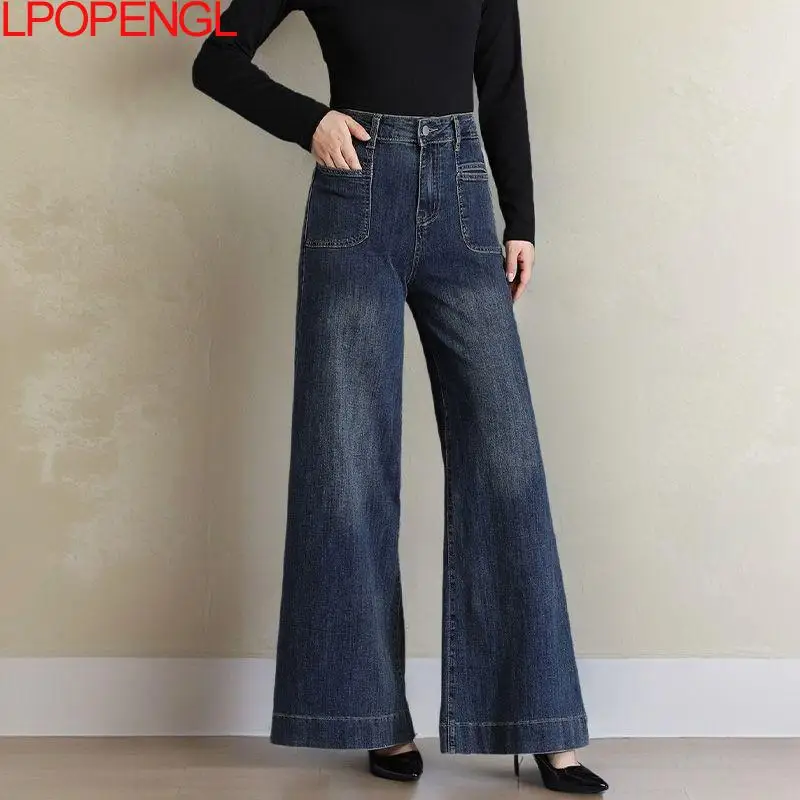 Moda Otoño e Invierno 2025 pantalones elásticos de mezclilla de cintura alta nuevos pantalones sueltos Retro Color sólido acampanado pantalones de pierna ancha tendencia