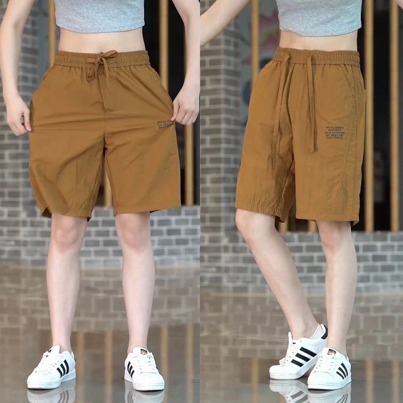 กางเกงลำลองผู้ชายผ้าไหมน้ำแข็ง ปี 2024 แบบบาง พิมพ์ลาย ห้าส่วน แฟชั่น ใส่ได้หลายโอกาส ทรงหลวม ใส่สบาย ระบายอากาศ ทรงตรง สำหรับฤดูร้อน