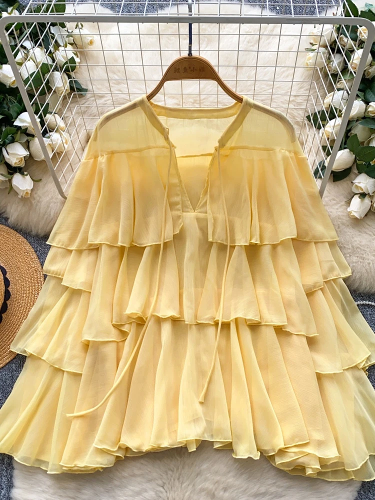 

Retro high-end mesh shirt women in spring new loose ruffled edges solid color unique and fashionable commute lace-up top