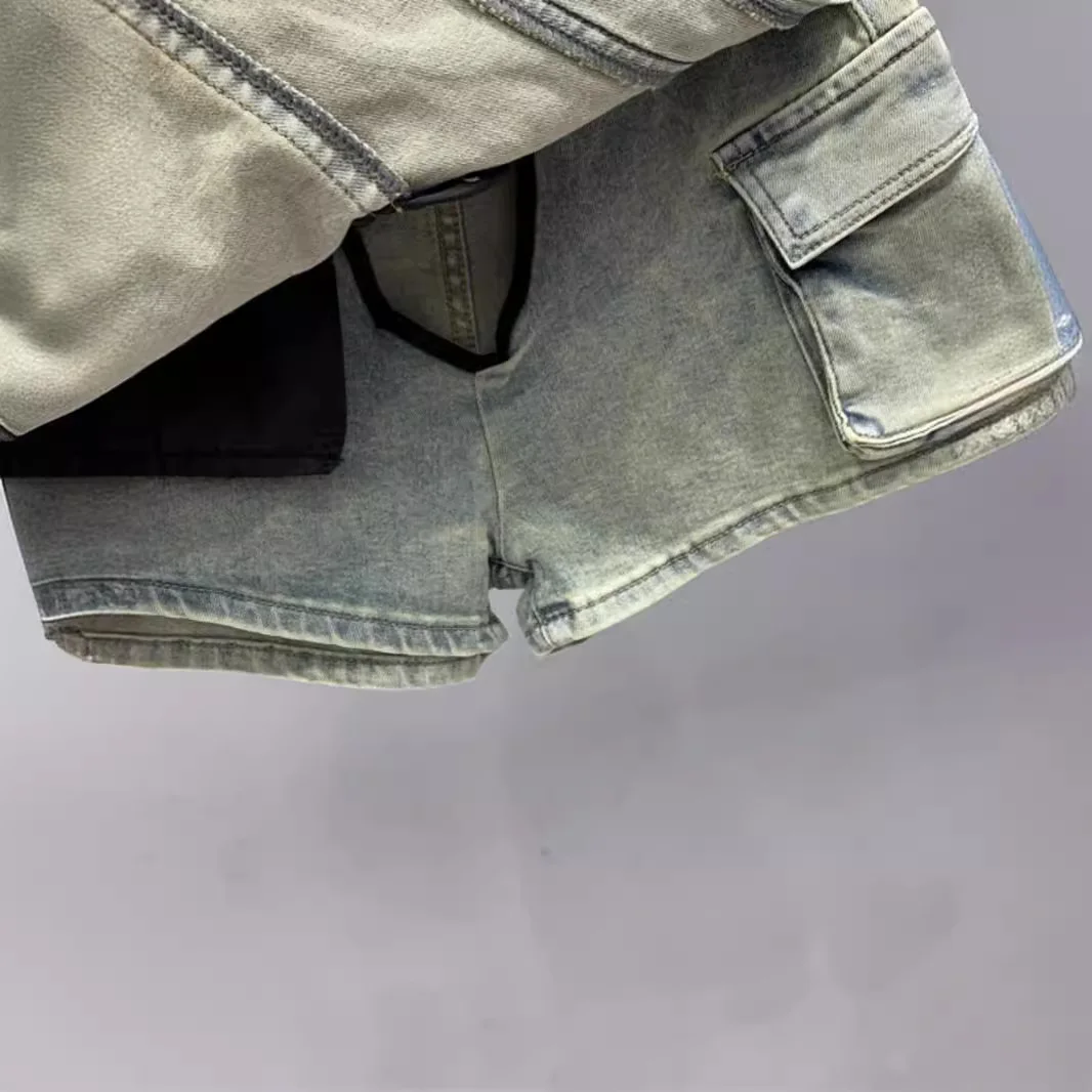 [Zoci] unregelmäßiges Mädchen 2024 Sommer neuer Stil, beunruhigt, großes Taschen design, gewaschener dreiteiliger kurzer Jeans rock, Hosen rock