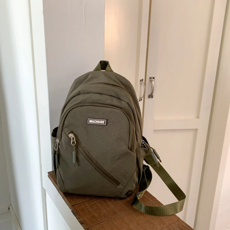 

2025 хит продаж, мягкие универсальные простые нагрудные сумки, повседневные женские рюкзаки, нейлоновые однотонные молодежные поясные сумки на молнии