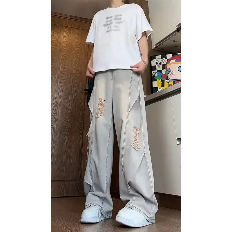 جينز ممزق مغسول باللون الأزرق للرجال صيفي أمريكي عالي الشارع فيبي سروال فضفاض واسع الساق