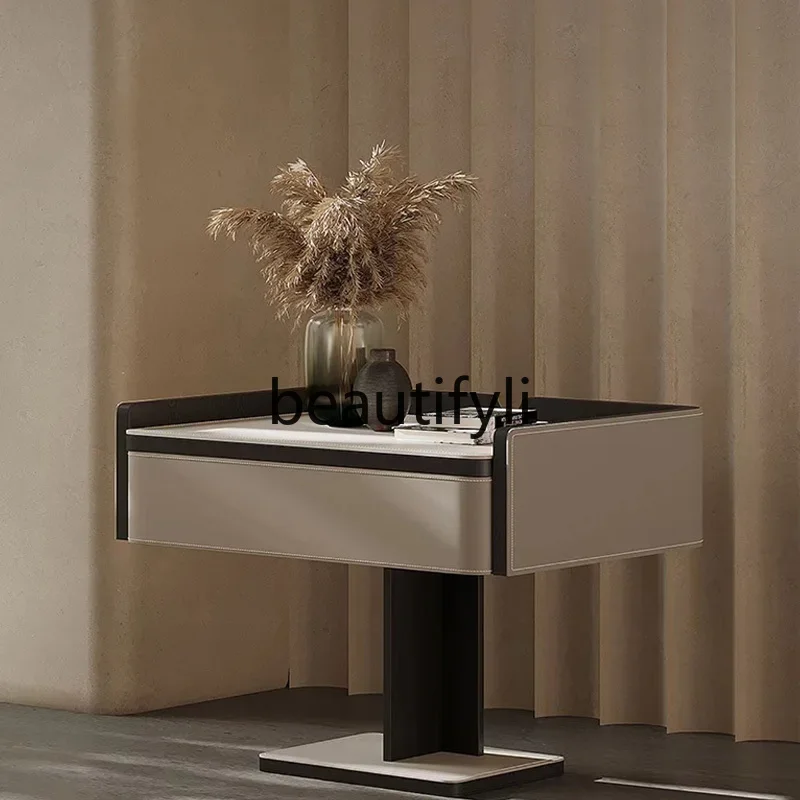 

Italian minimalist bedside table saddle leather modern minimalist light luxury high-end bedside storage cabinet