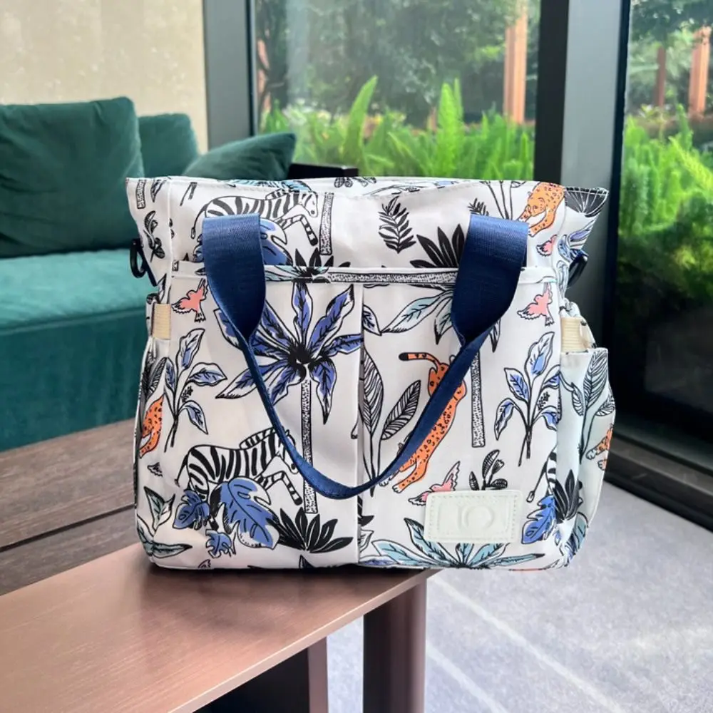 Draagbare waterdichte mama handtas Oxford afdrukken babyluiertas effen kleur grote capaciteit babyverzorgingstas reizen