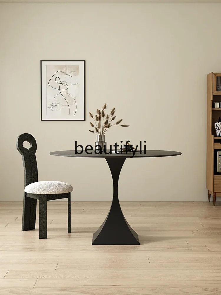 Pure black rock slab round dining table Extreme home restaurant dining table Deli Feng Wabi Sansan round table